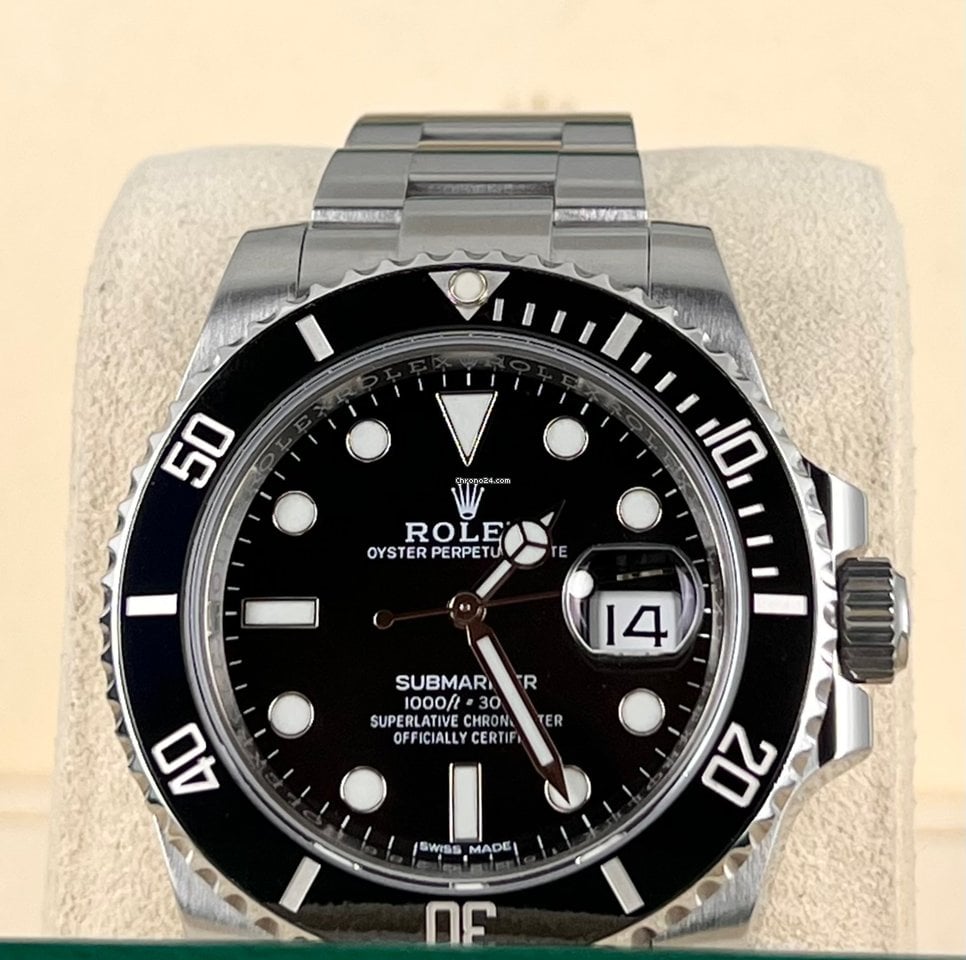 Submariner Date, wie neu, Box und Papiere