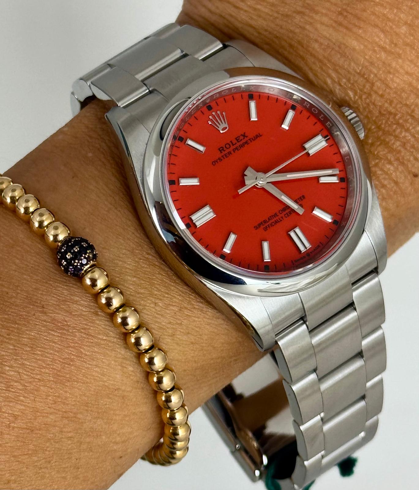 Rolex Oyster Perpetual 36 mit korallenrotem Zifferblatt, Full Set 2021